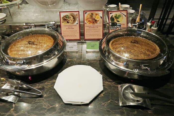 a group of bowls of food on a table