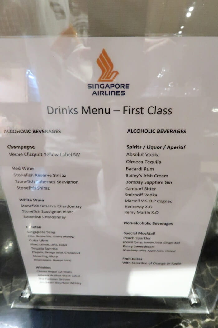 a menu sign with text and images