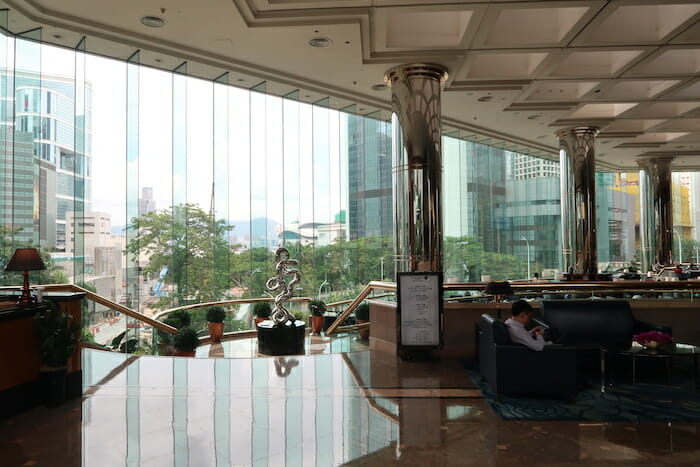 a large glass room with a large window