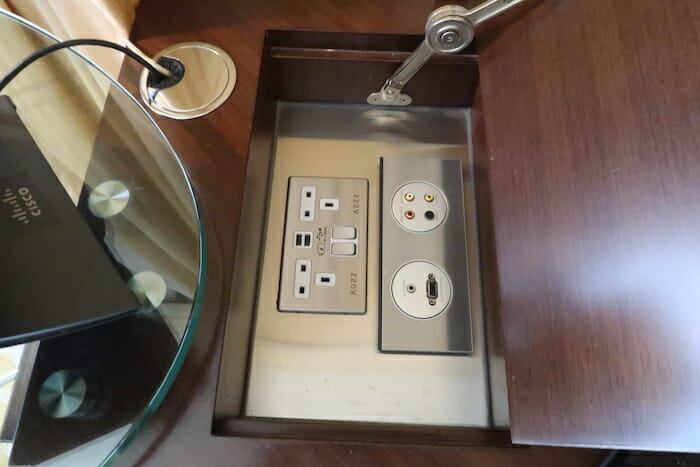 a rectangular outlet with a metal cover