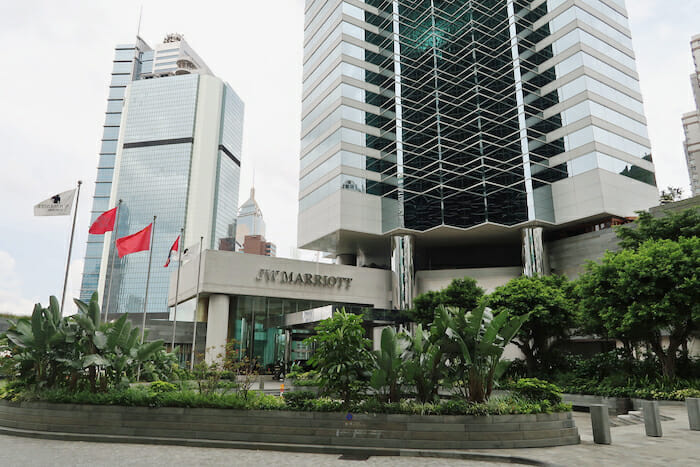 a building with flags in front of it