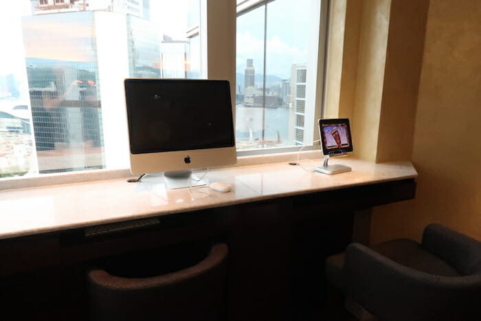 a computer and a tablet on a counter