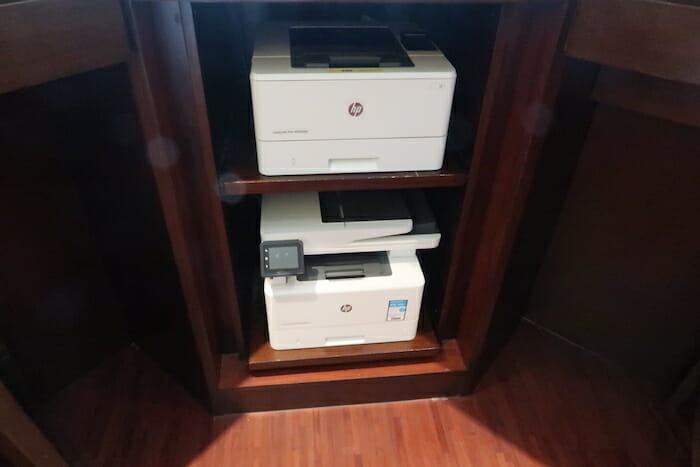 a printer on a shelf