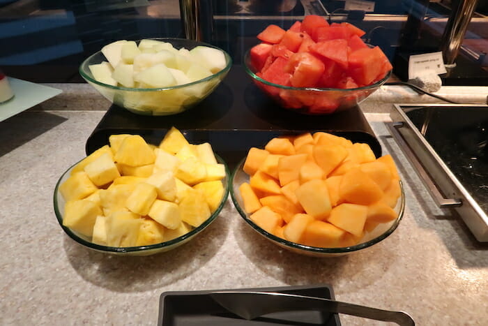 a group of bowls of fruit