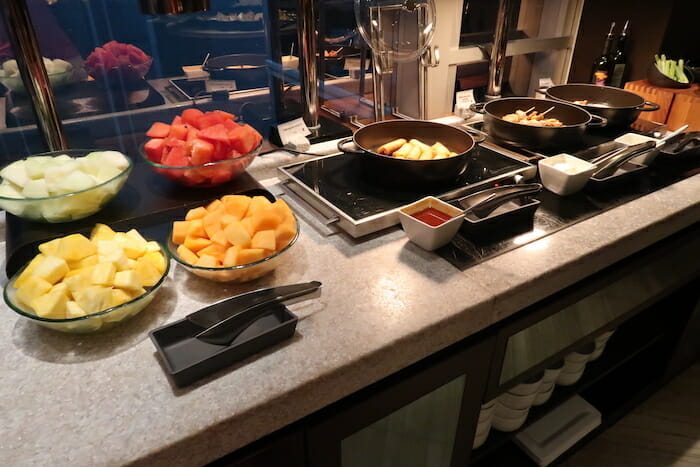 a table with bowls of food on it