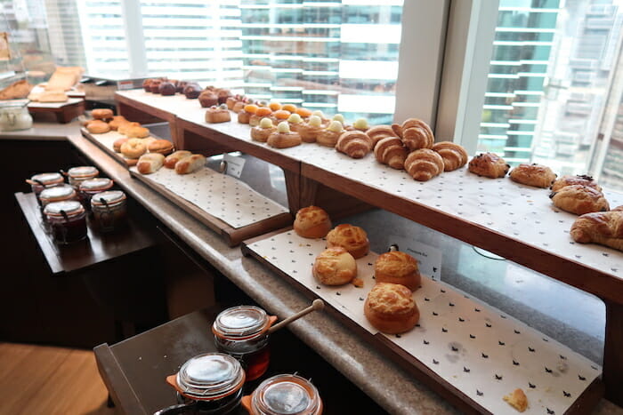 a shelf with pastries on it