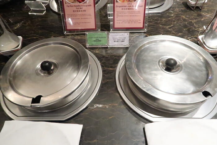 a group of metal containers on a table