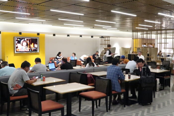 a group of people sitting at tables