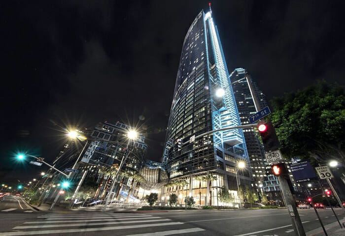 a city street with a tall building