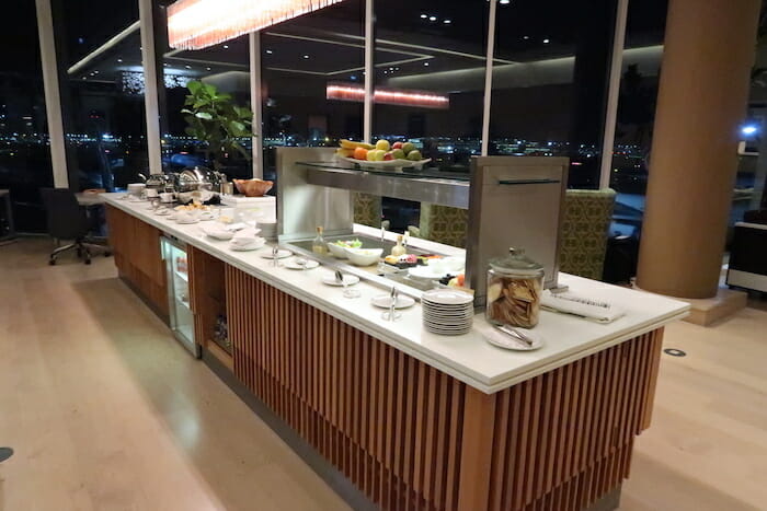 a buffet table with food on it