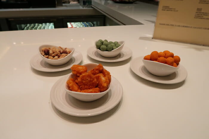 a group of bowls of food on a table