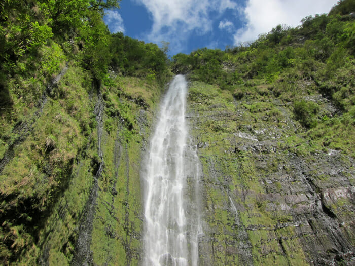 a waterfall on a cliff