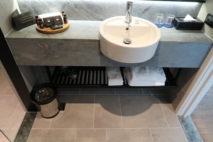 a sink with a towel on the counter