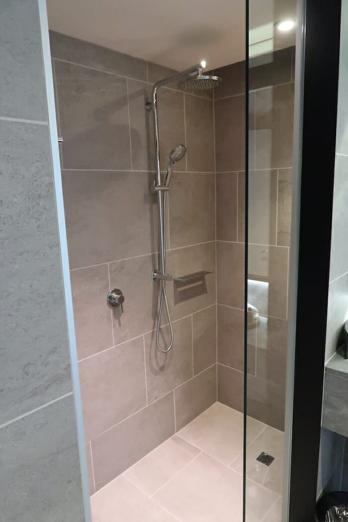 a shower with a glass door