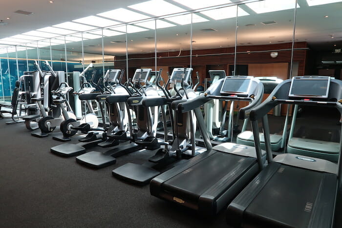 a group of treadmills in a gym