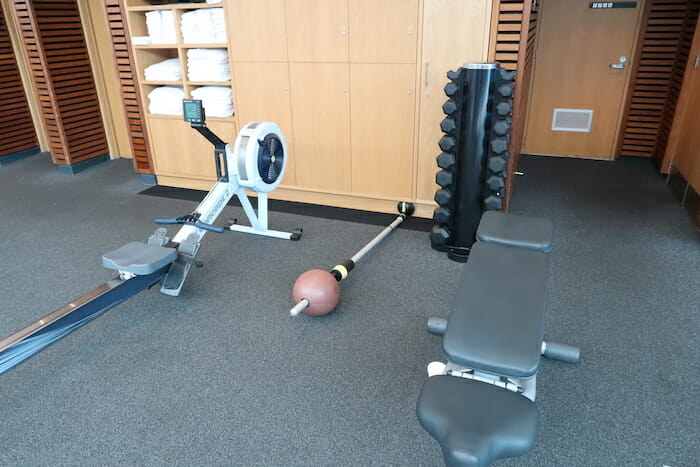 a gym with weights and exercise equipment