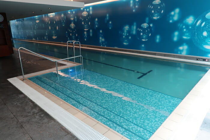 a swimming pool with a ladder