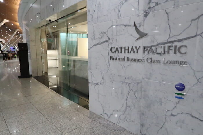 a marble wall with glass doors