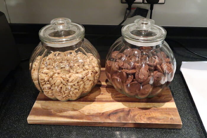 a couple of glass jars with food in them