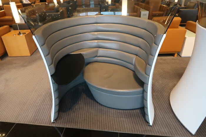 a chair with a table in the middle