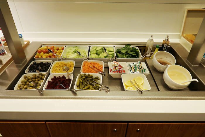 a counter with bowls of food