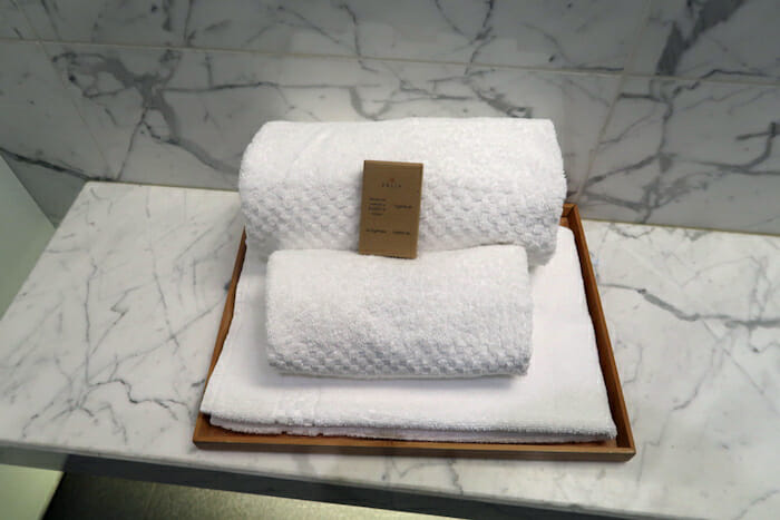 a stack of towels on a tray