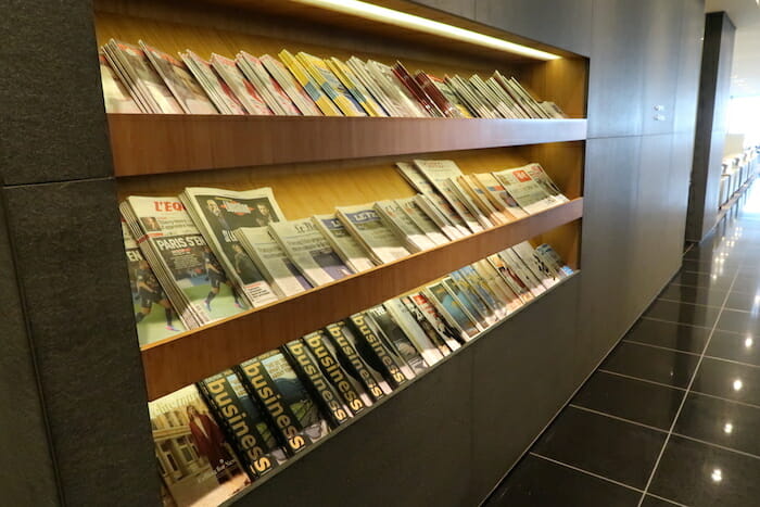 a shelf with magazines on it