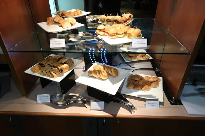 a display of food on a glass shelf