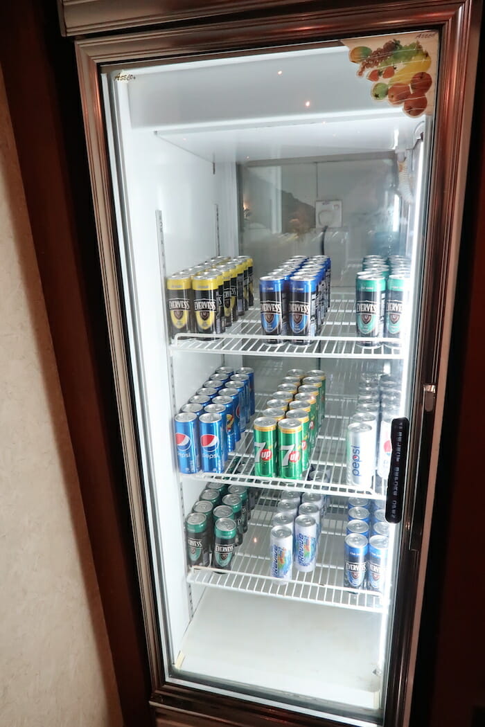 a refrigerator full of cans