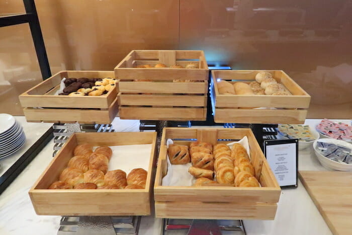 a group of wooden baskets of pastries