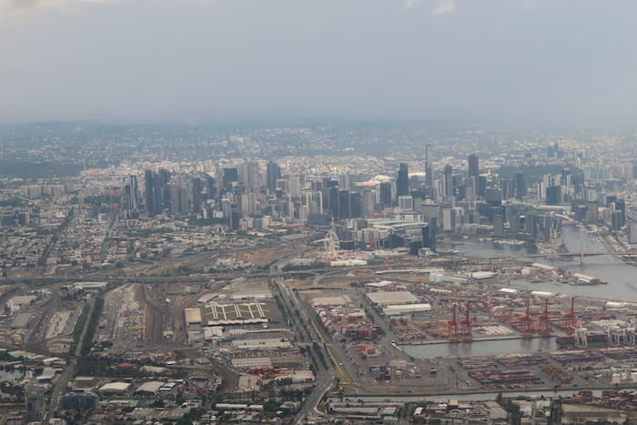 a city with many buildings and a body of water