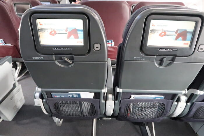 a two seats with a screen on the back