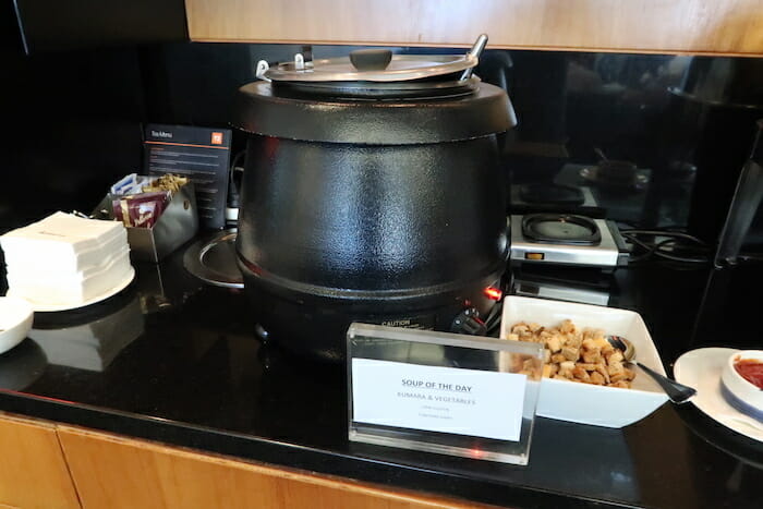 a black pot with a lid on a counter