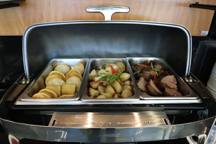 a trays of food in a container