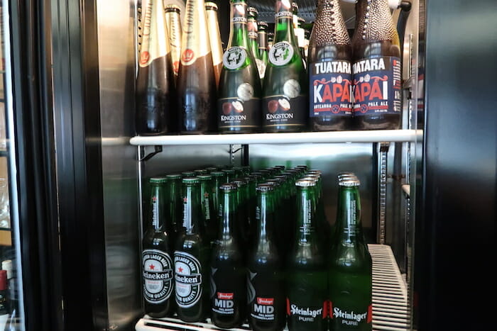 a shelf of beer bottles