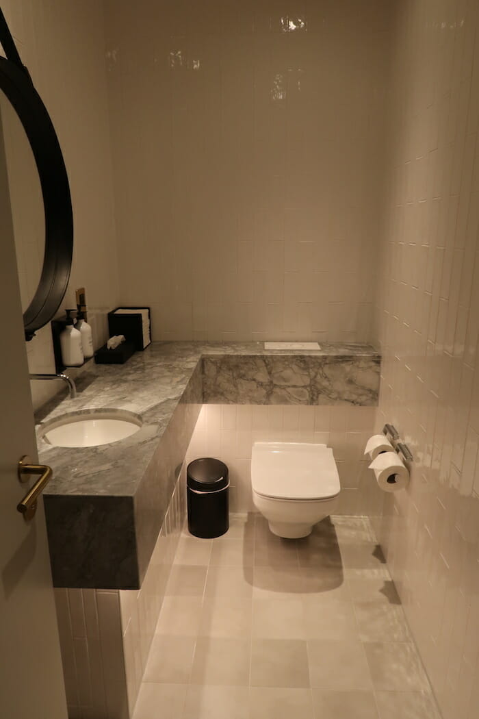 a bathroom with a sink and toilet