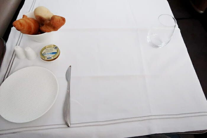 a plate and knife on a table