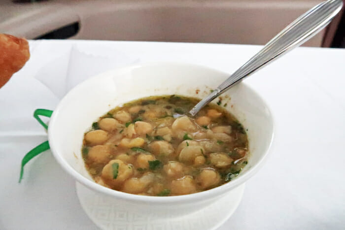 a bowl of soup with a spoon