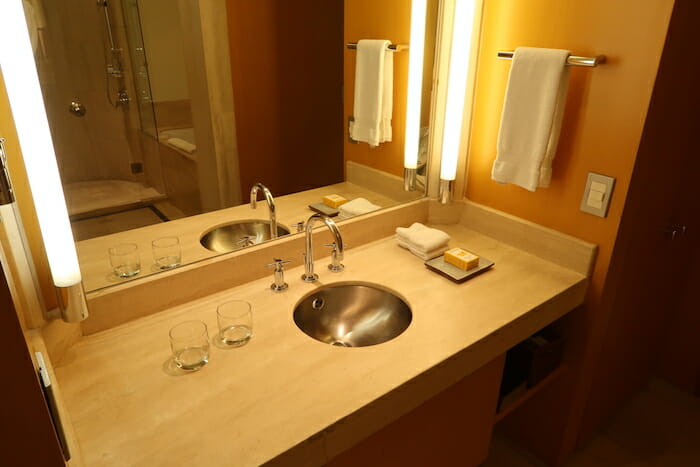 a bathroom with a sink and a mirror