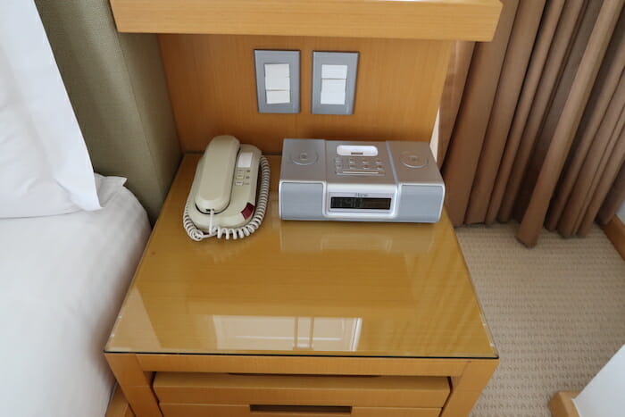 a phone and a radio on a table