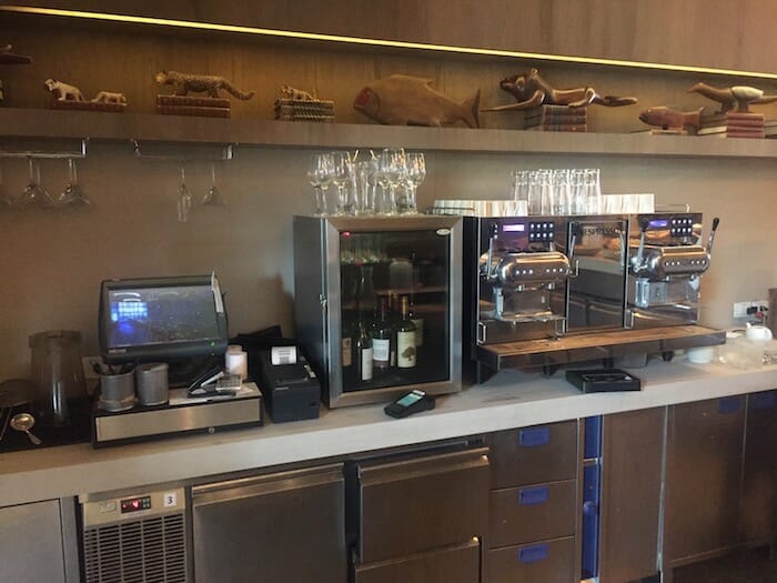 a bar with a counter and a bar with a bar and a bar