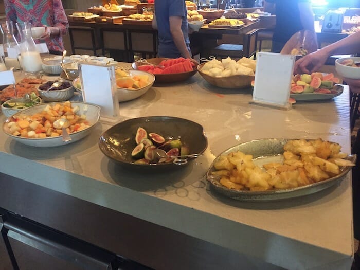 a buffet table full of fruit