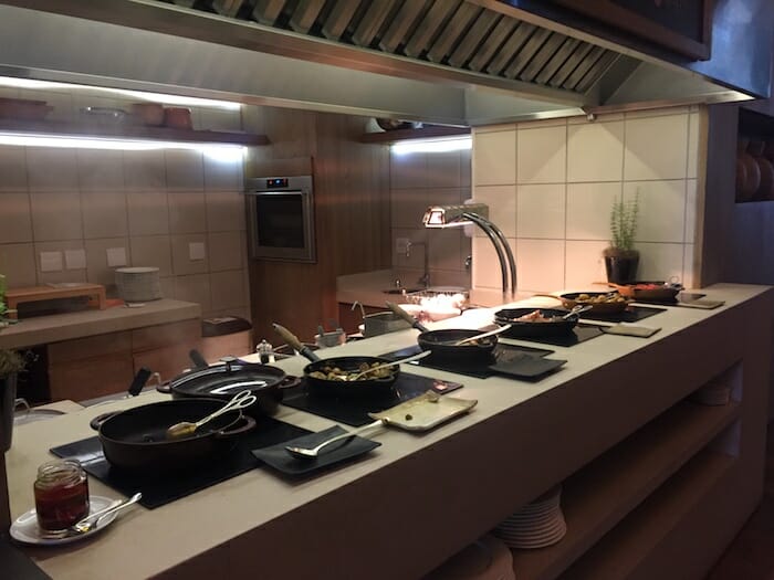 a kitchen with pans and utensils