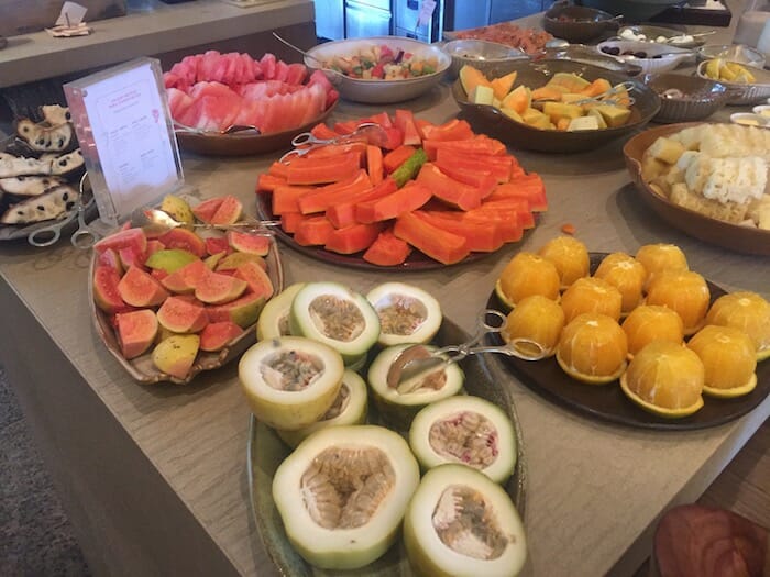 a table full of different fruits