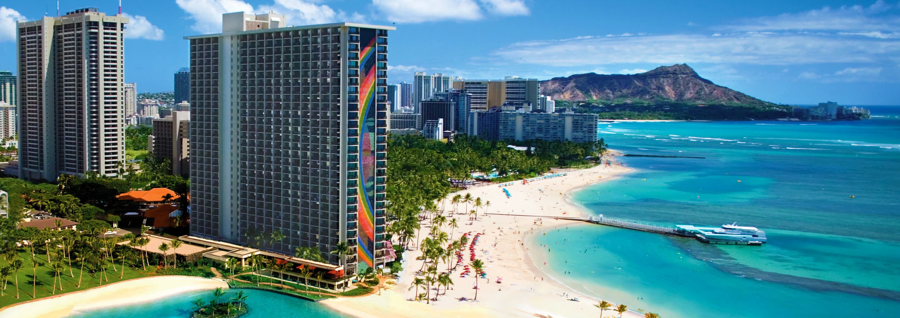 a tall building on a beach