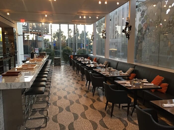 a restaurant with tables and chairs