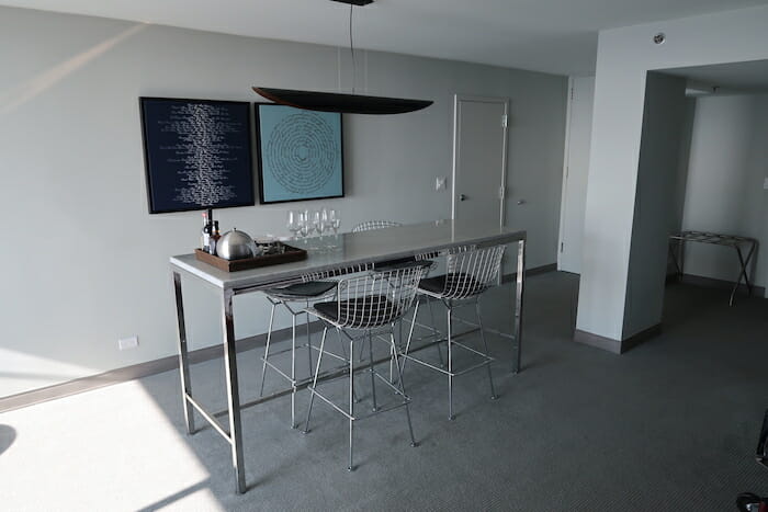 a table with chairs and a tray on it