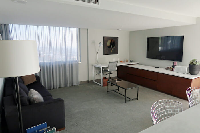 a room with a tv and a couch