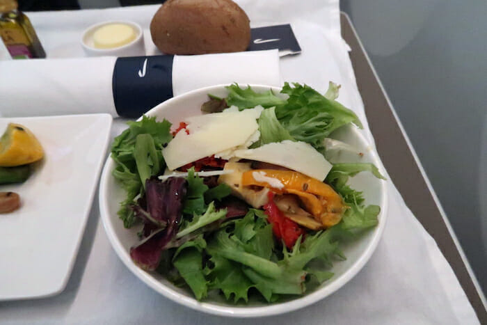 a bowl of salad on a table