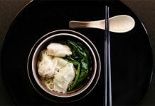 a bowl of noodles and vegetables